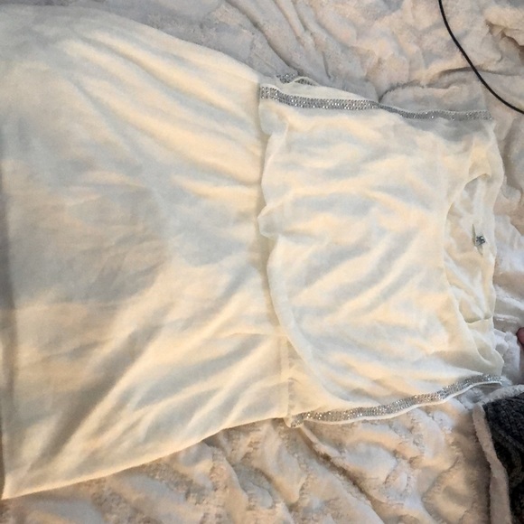 Ya Los Angeles Dresses & Skirts - Cream/white mini dress with silver Rhine stones down the sides of the arms
